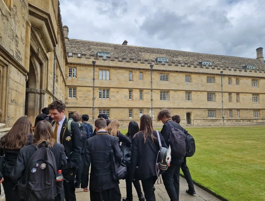 Year 10 students in a college quad at Oxford University